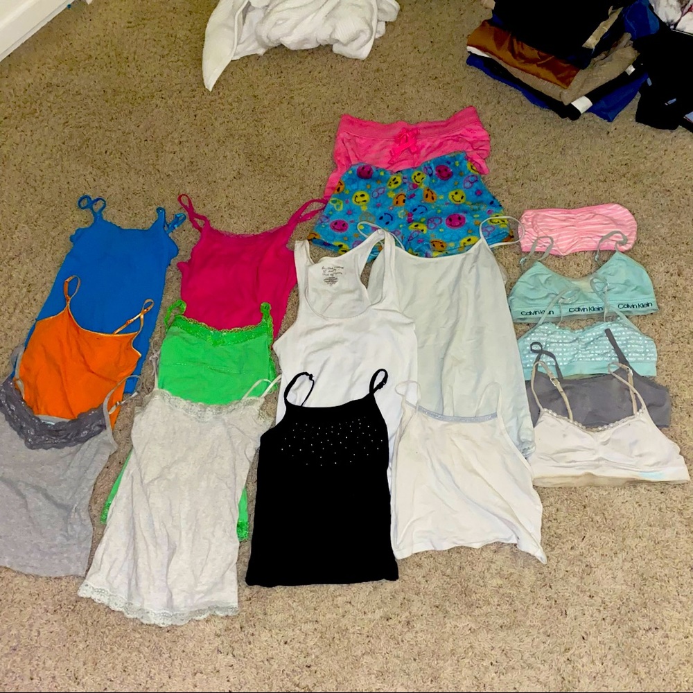 10 tank tops, five trainer bras, and two PJ shorts